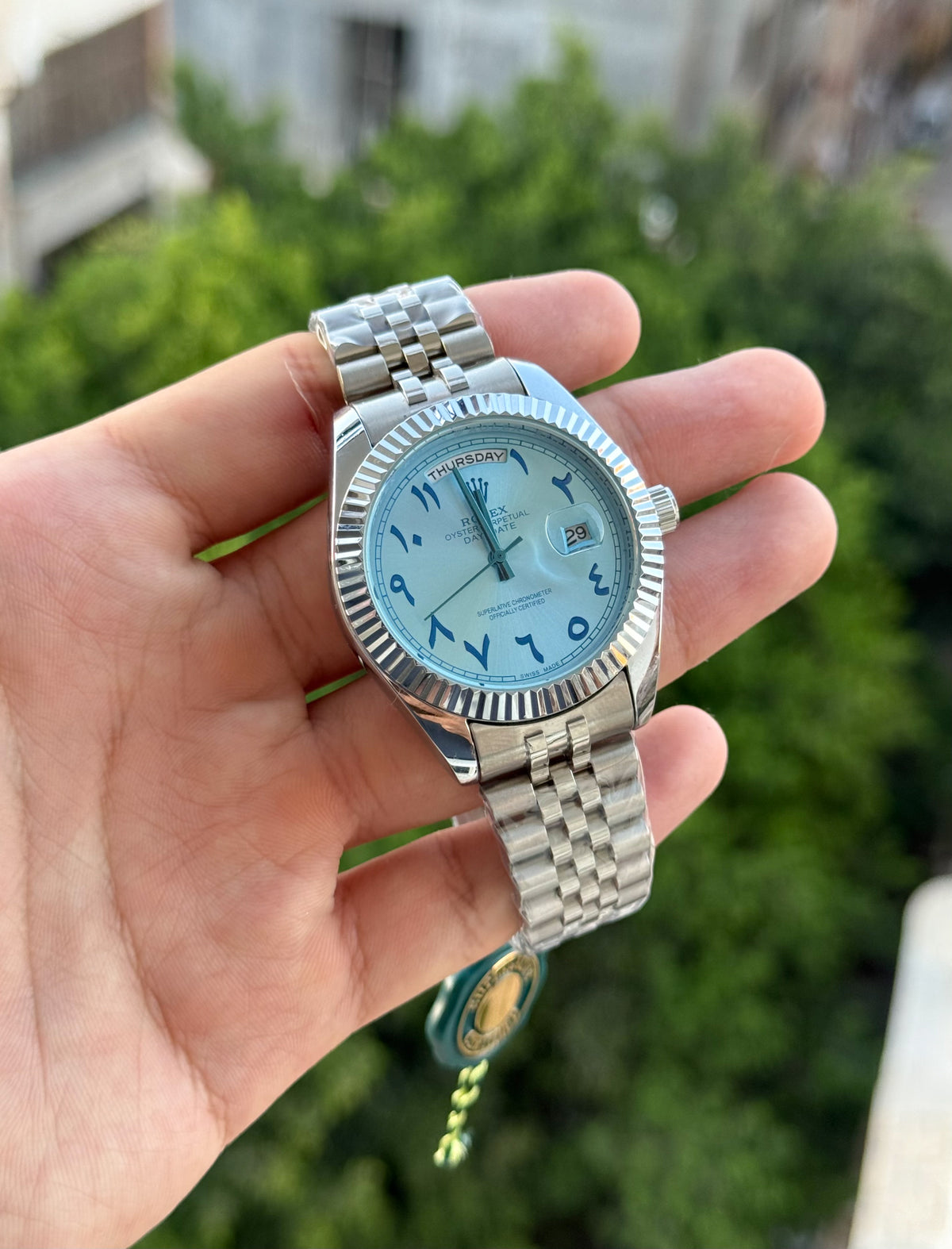 Rolex day date ice blue arabic