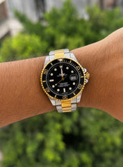 Rolex submariner gold black