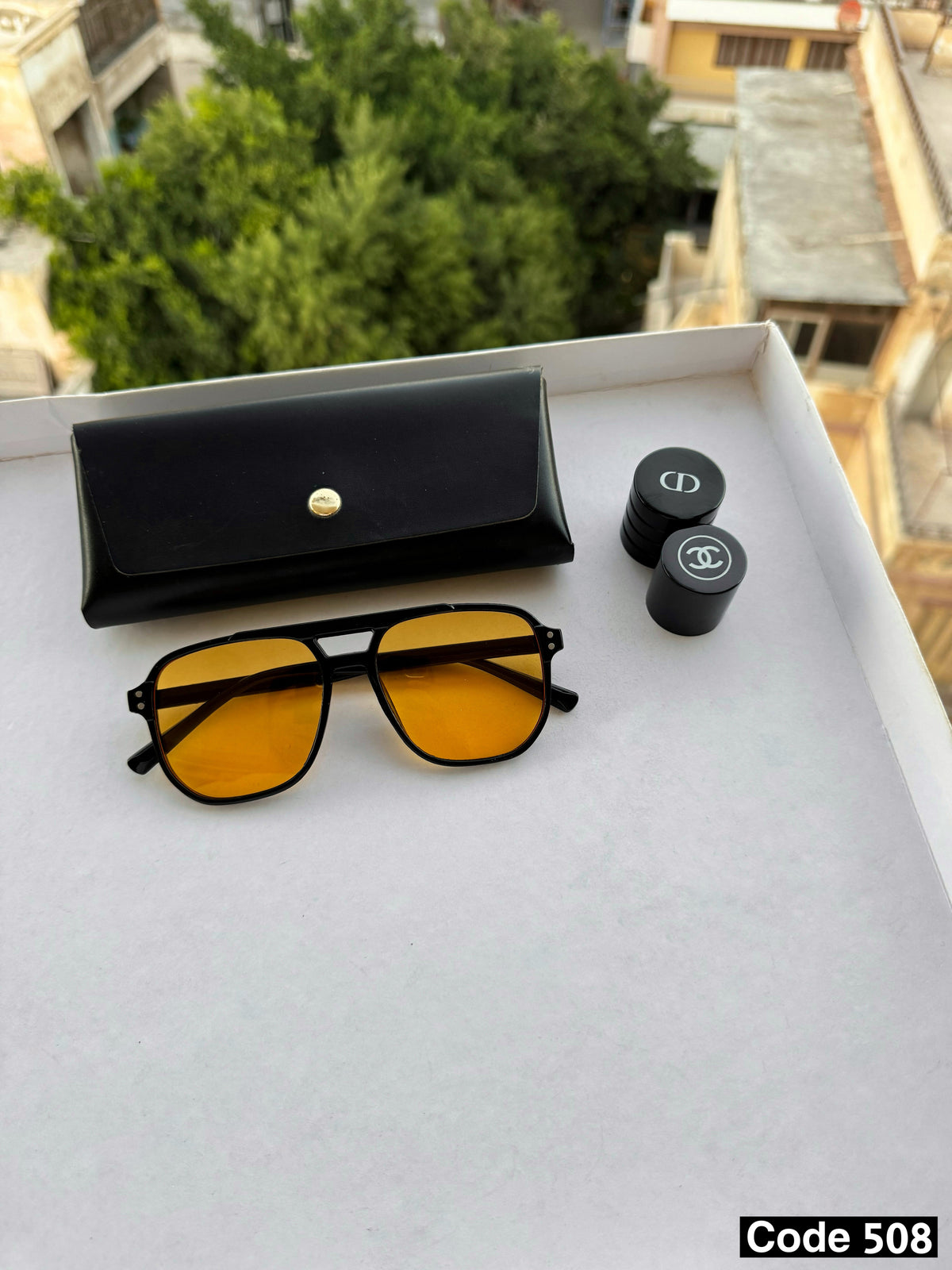 Orange aviatior sunglasses